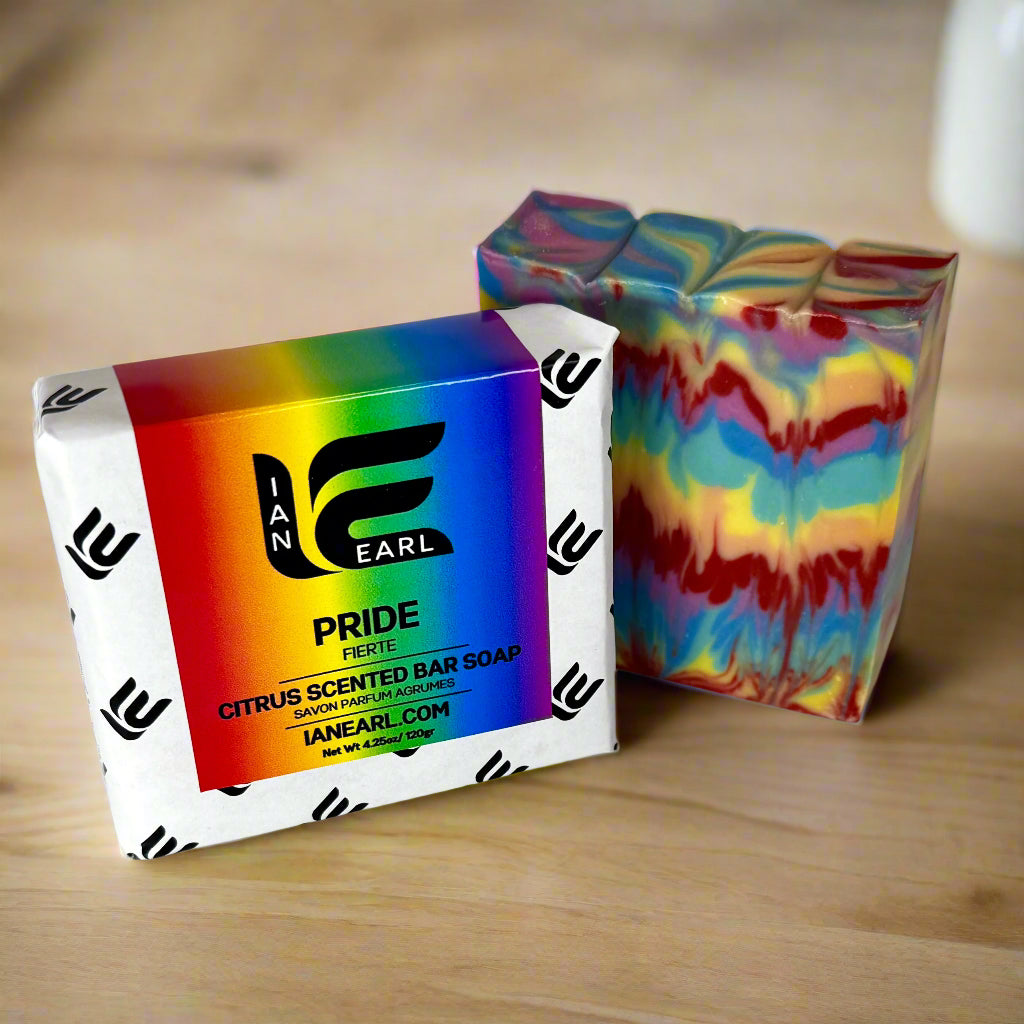 Pride bar soap and packaging on wood